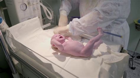 Newborn Baby With Hand Holding Umbilical Stock Footage SBV 329895562