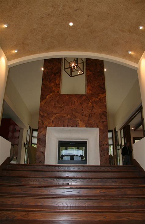In addition to the ceiling tiles and plaster finishes, crown molding can be installed around the perimeter of the ceiling to provide a distinguished barrier between the wall and the ceiling. Verona Venetian Plaster Fireplace and Mantovano Ceiling ...