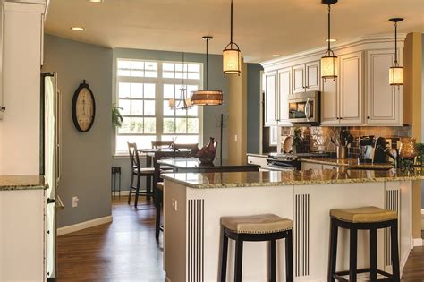Islet kitchen or kitchen island can be seen as an ideal transition between the living room and kitchenette. Cabinets & Installation | Buck Creek Granite & Flooring