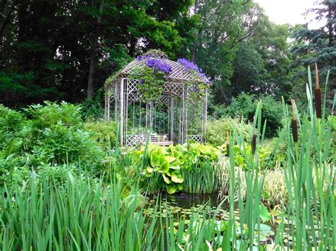 Cottage Garden With Pond Gazebo And Vibrant Flowers Hgtv Ultimate