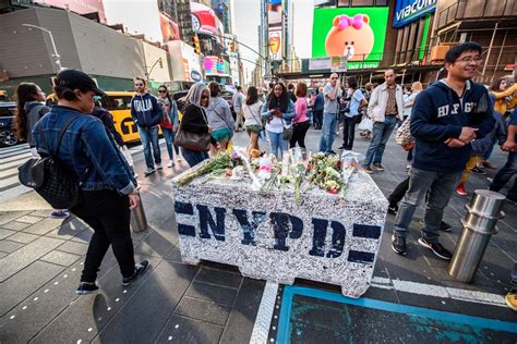 Photos See The Touching Memorial Set Up In Times Square For Crash