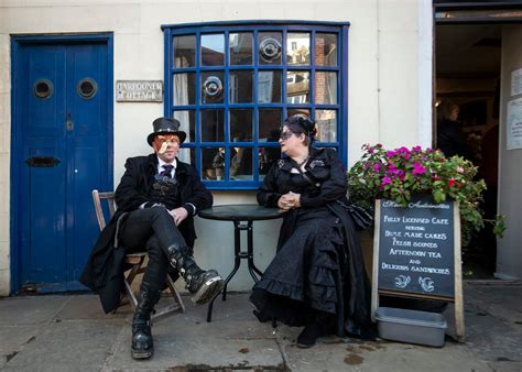 paddleboarders celebrate whitby goth weekend with witch costumes express and star