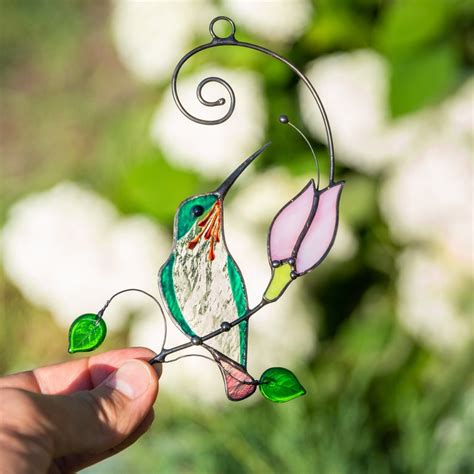 This ornament was handmade by me using the tiffany copper foil method. Hummingbird stained glass window hangings Christmas gifts ...