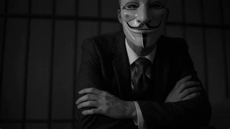 View of Anonymous hacker man in prison Stock Video Footage - Storyblocks