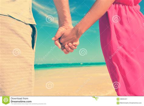Closeup Of Couple Holding Hands At Beach Stock Image Image Of Holding