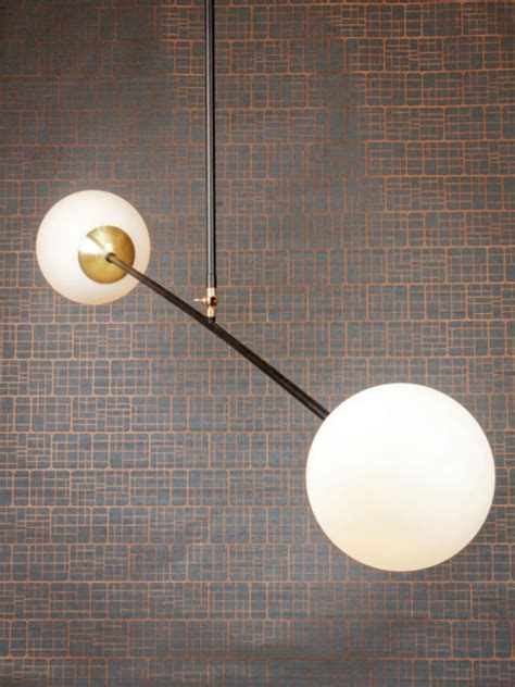 When illuminated, the lamp glows with the sferis pendant light by ai lati is a timeless and italian made display of artisanal work. Retro ceiling light in a matte black finish with opal ...