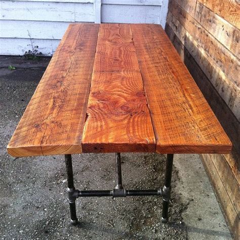 Give your presentations, photos, and documents a bigger screen. Barn-Wood Dining Table with Cast-Iron Legs.