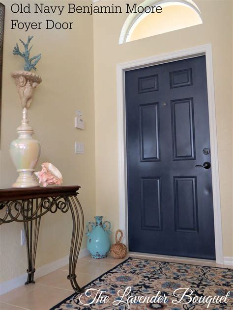 Use an angled brush to reach spots a flat brush cannot. Just a quick change in our vacation home front door color ...