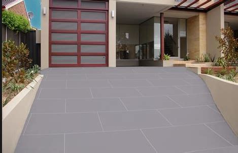 The addition of driveway gates can provide added security and safety. Patterned driveway-shape could match your pathway pavers ...