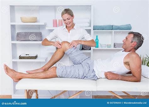 Man Having Leg Massage Stock Photo Image Of Checking 54759644