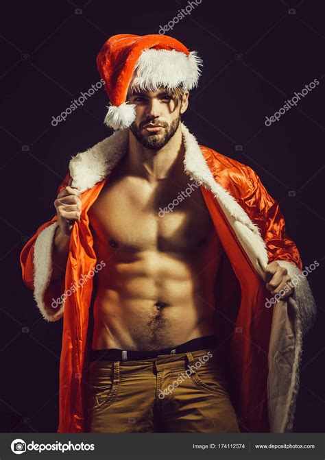 Handsome Muscular Christmas Santa Man Stock Photo By Tverdohlib Com