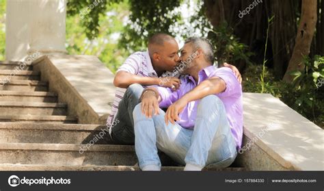 Gay People Two Men Kissing On Stairs In Park Stock Photo By ©diego