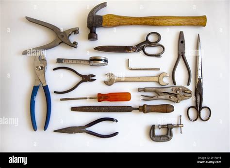 A Top View Of Vintage Metalwork Tools Isolated On A White Background