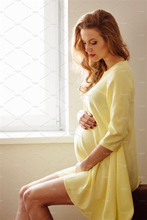beautiful pregnant girl featuring adult alone and attractive people images ~ creative market