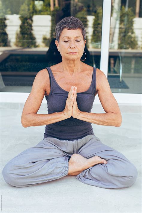 Senior Woman Meditating Outdoors Del Colaborador De Stocksy Lumina Stocksy