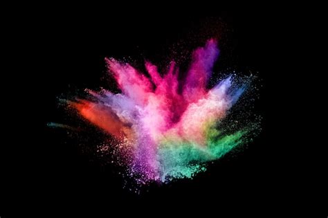 Premium Photo Abstract Colored Dust Explosion On A Black Background