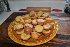 Pour sauce all over the hot cake and let it stand for 1 full hour before unmolding the cake to cool completely. PAULA DEEN'S LEMON BLOSSOMS