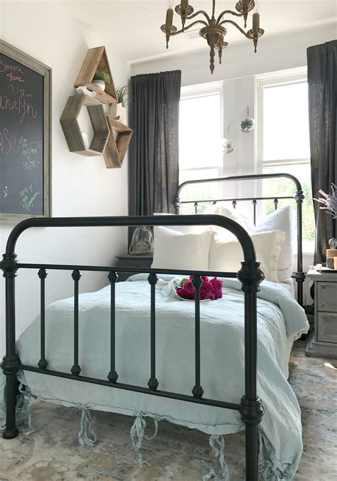 This teenage girl's bedroom features a large 'love' wall sticker, to very cool effect. Fun, Cool, and Trendy Teenage Girls Bedroom - Hallstrom Home