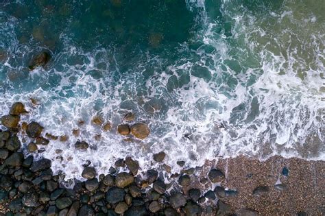 Vacation And Travel Concept Aerial View Of Pebbles Beach With Colorful