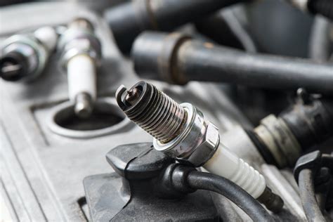 Bad Spark Plug Symptoms In The Garage With