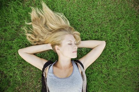 Blonde Girl Lying On Grass Stock Image Image Of Happy 24714135