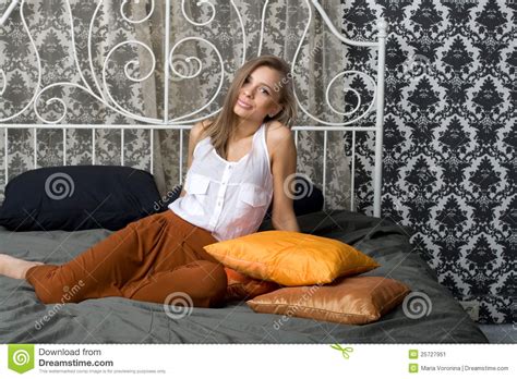 Pretty Girl Sitting On Bed Stock Image Image Of Pillows 25727951