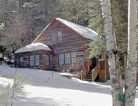Queen bed in the bedroom, separate living room with love seat and rocker or recliner, wood stove w /glass door, tv, kitchen, microwave, range, and refrigeratormax occupancy up to 2 adultseach cabin is outfitted with most items needed to cook, make coffee and serve food/drinks. Another Cloudcroft Cabin