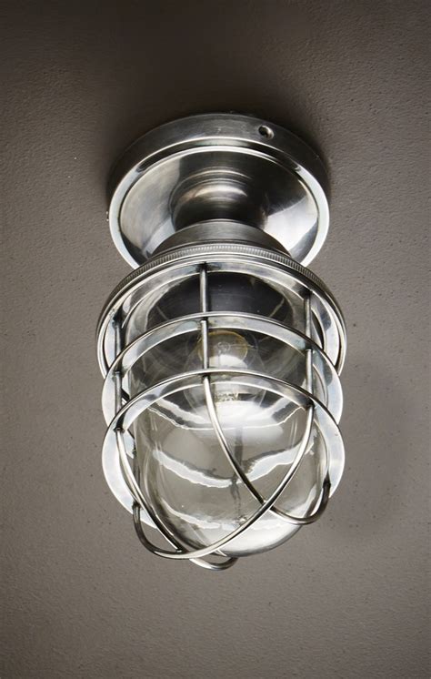 Blown crackled glass spheres are highlighted by a soft light that passes through the translucent silver shades. Dalton Flush Mount Light Antique Silver - ELPIM50430AS