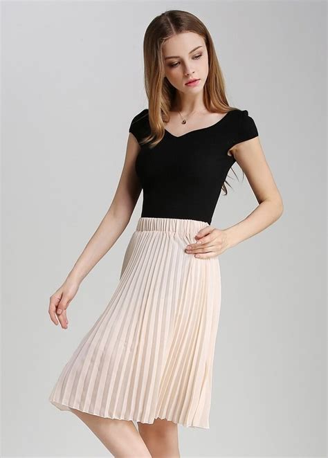 Click On The Photo To Shop This Beautiful Beige Pleated Skirt New