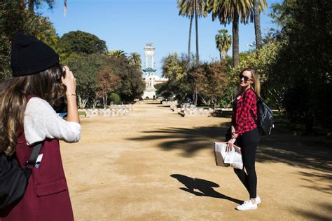 Free Photo Women Taking Photos In Park