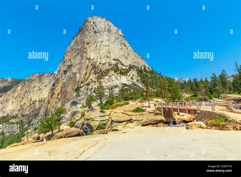 Liberty Cap Peak And Bridge Of Nevada Fall Waterfall On Merced River