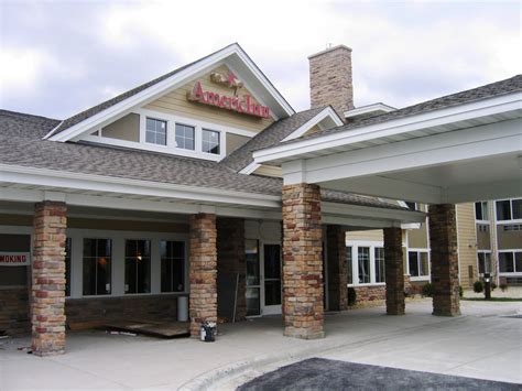 The american inn features an outdoor pool and rooms equipped with a microwave and refrigerator. AmericInn, Waconia MN - RAM General Contracting