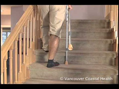 Male legs going up stairs. Walking up and down steps with a cane | Doovi