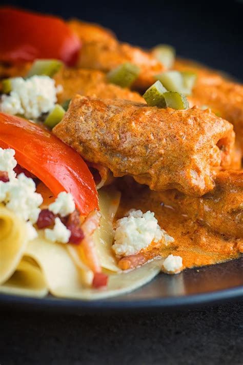 My kitchen in spain louisiana seafood feast. Close up tall image of catfish paprikash with tomatoes and ...