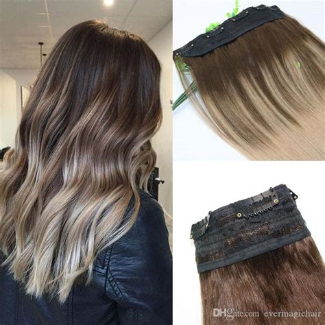 The curly lob is such a fun hairstyle to try out that can be paired beautifully with striking blonde highlights and a full set of blunt bangs. Ombre Ash Blonde With Warm Highlights Dark Brown Root One ...