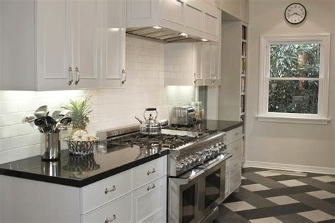 An inky surface also works in a more traditional kitchen; Polished Black Countertops - Transitional - kitchen ...