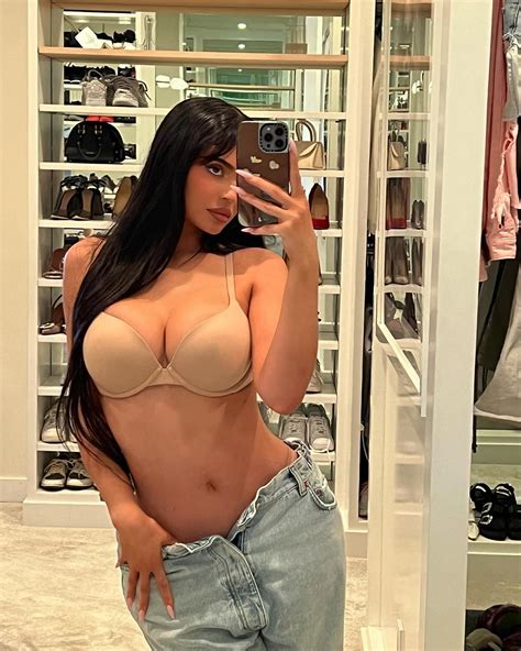 Kylie Jenner Nearly Busts Out Of Her Nude Bra And Baggy Jeans In Sultry