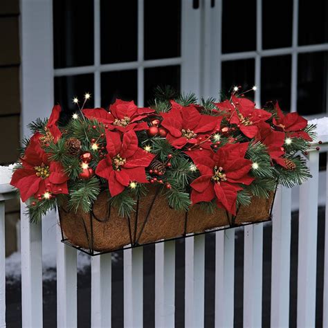 The Cordless Prelit Poinsettia Flower Box  Hammacher Schlemmer