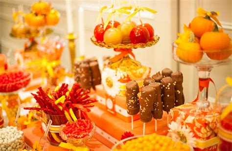 autumn candy buffet with pumpkins and carmel apples by sweet design company candy buffet