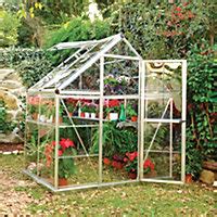 This simple indoor greenhouse is right for a small space, it's built of wood and there are some containers for growing. Palram Harmony 6x4 Polycarbonate Apex Greenhouse | DIY at B&Q