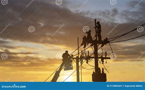 Silhouettes Electrician Working On Poles To Install Stock Image Image