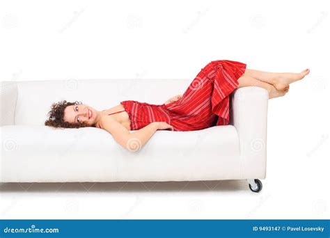 Young Woman In Red Dress Lies On White Sofa Stock Image Image Of