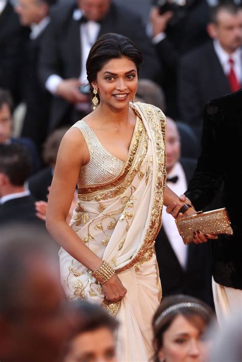Deepika padukone lycra slik and net sequins work red bollywood style saree. Deepika Padukone in Rohit Bal's Saree at Cannes Film ...
