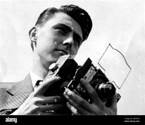 A Young Press Photographer Of The 1950s With A Vn Press Camera Stock