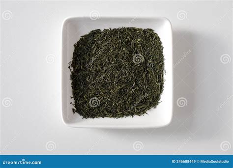 Dry Green Tea Leaves In A White Square Plate Stock Image Image Of