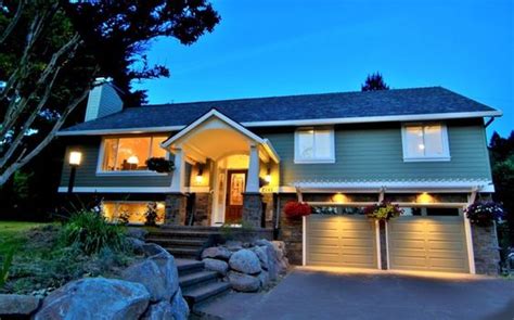 I saw a great one that had a real basement under half of the house, next to, and a short flight down. Split Level Addition Home Design - Style & Designs