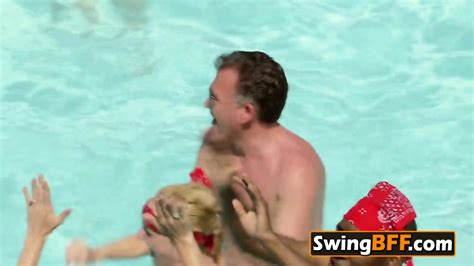Swinger Couples Are Teasing Each Other In The Pool Hottie Starts To Interact Sexually With