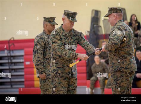 Us Marine Corps Sgt Maj Robert W Pullen Hands Col Andrew M Regan