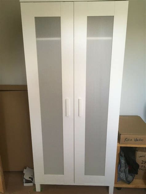 Tyssedal wardrobe, white, mirror glass, 34 5/8x22 7/8x81 7/8. Ikea wardrobes. 2 off, white with plastic door centers ...