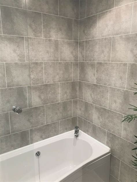 These bathroom wall panels bring the tranquility of silence where you require it most. Cutline Grey Tile Effect Bathroom Wall Panels PVC Shower ...